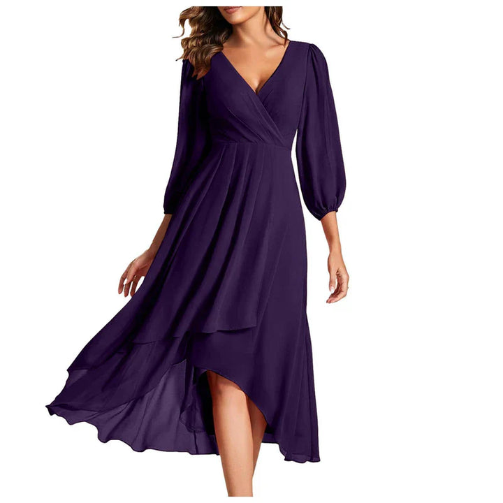 VITTORIA | Elegant dress with asymmetric hem and flowing sleeves. Refined look for any occasion