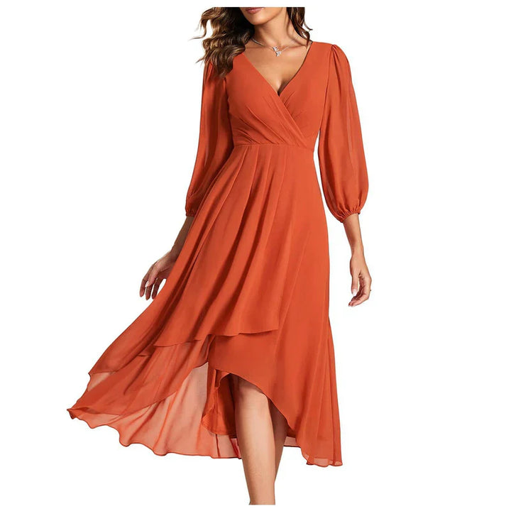VITTORIA | Elegant dress with asymmetric hem and flowing sleeves. Refined look for any occasion