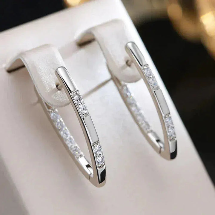 Refined earrings with zirconia stones