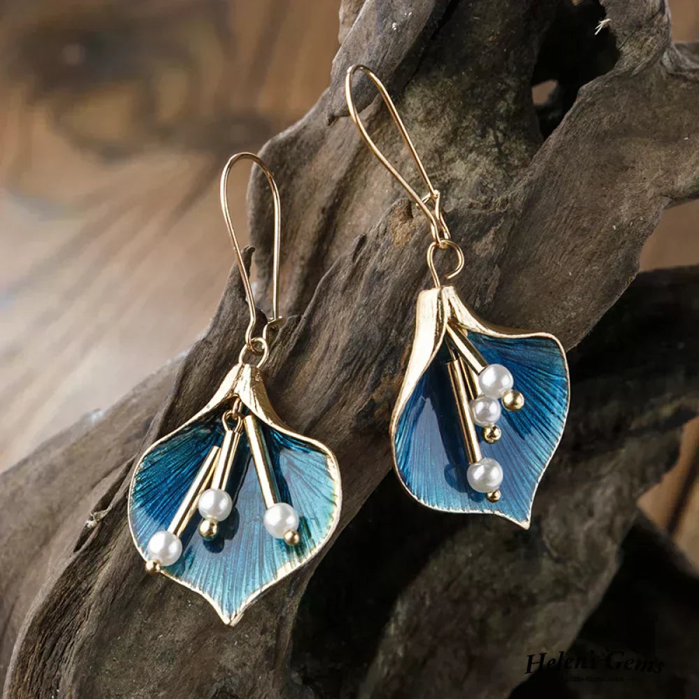 Gold and blue earrings with pearls
